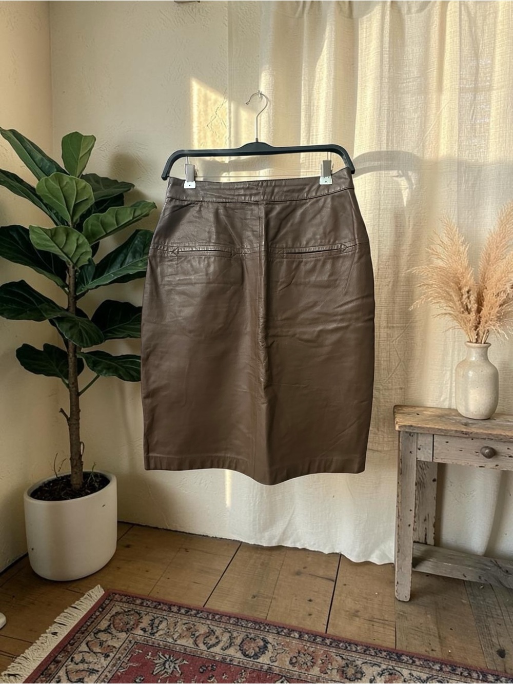 Charles Klein Vintage Leather Mini Skirt.
Choc. Brown. Size: Small (26” waist)